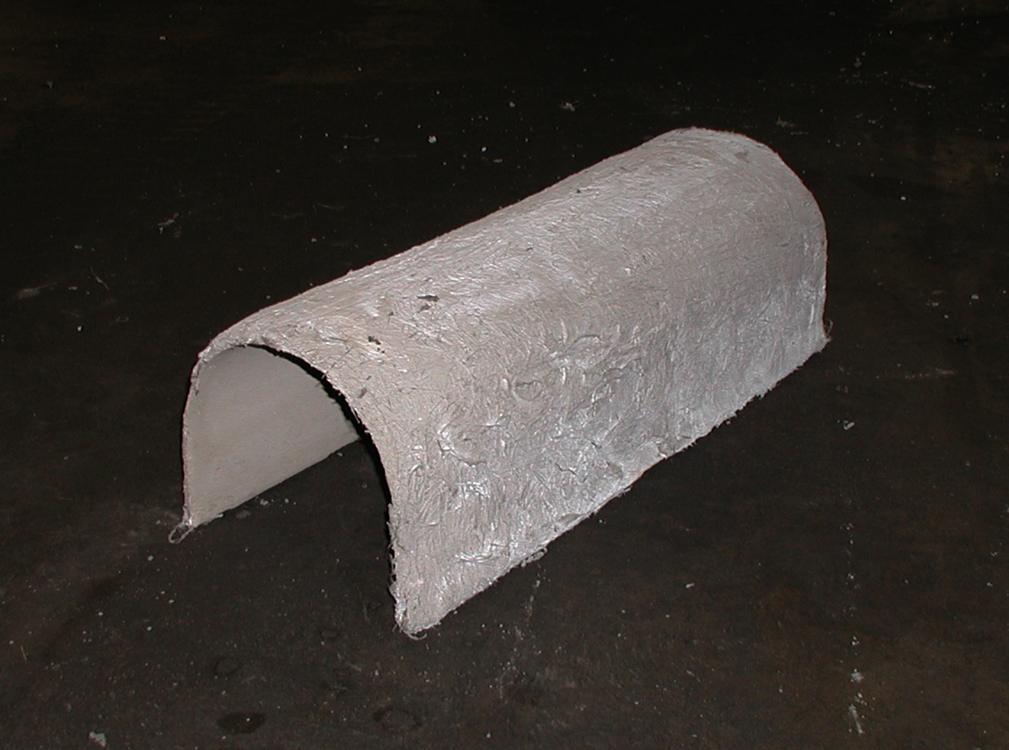 Fibercrete cable protector houses buried cabling to protect from