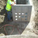 Pull Box Being Installed with PVC Cable Openings Photo Link